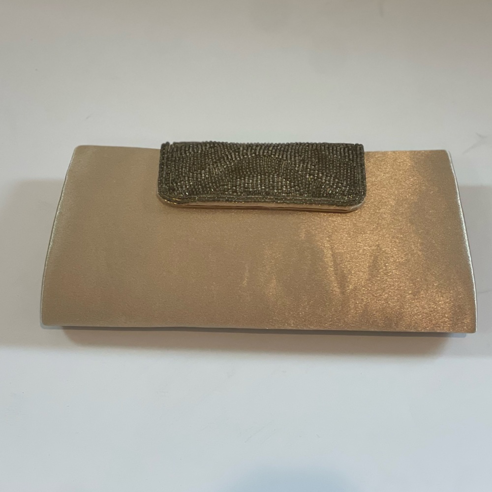 CACHE gold clutch